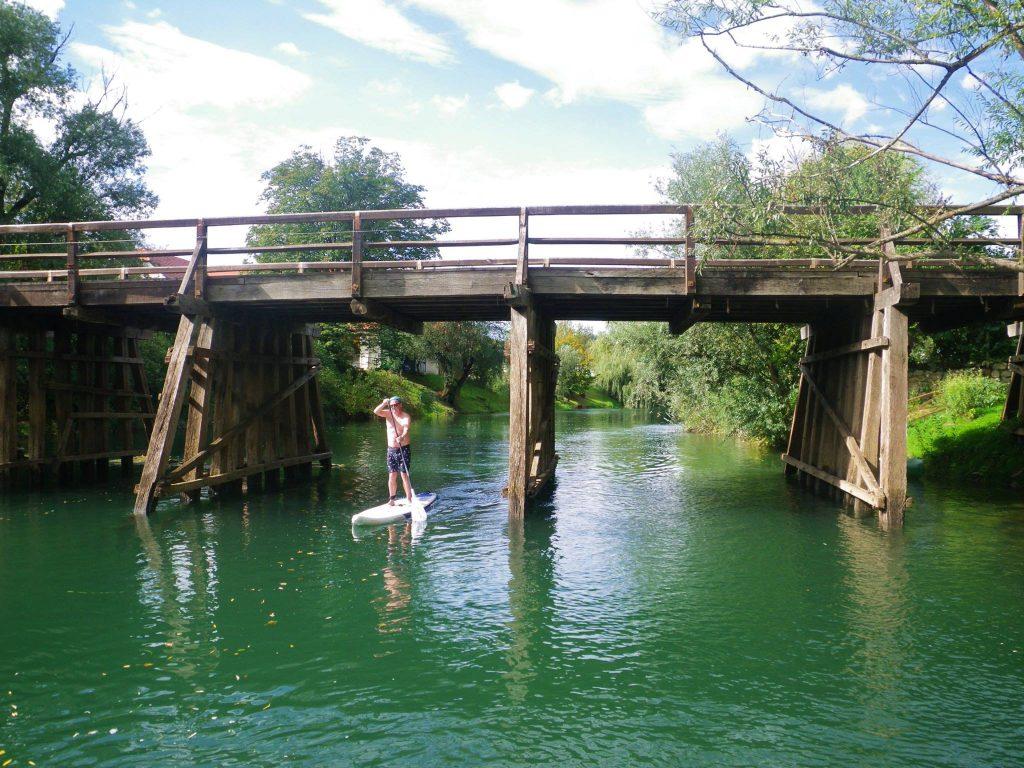 A wooden bridge to the island at Kostanjevica on The Krka River
