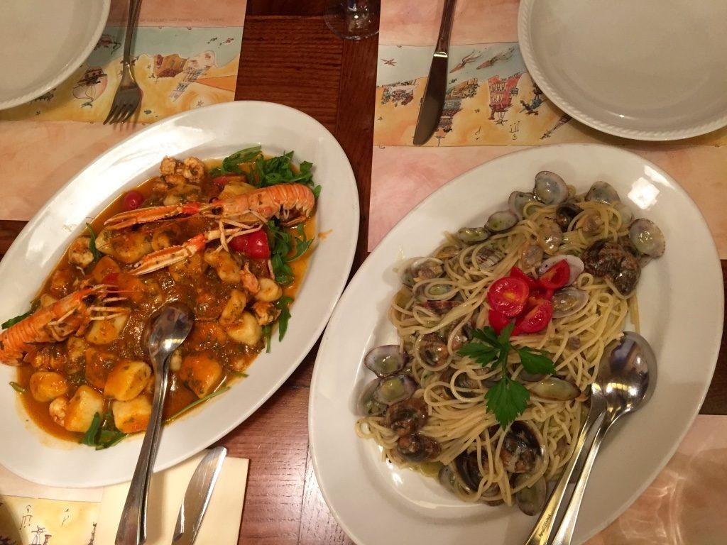 Gnocchi with scampi sauce, spaghetti with sea shells